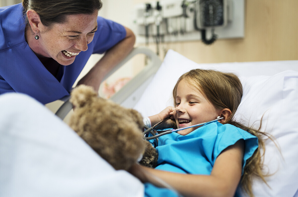 Nurse with young girl