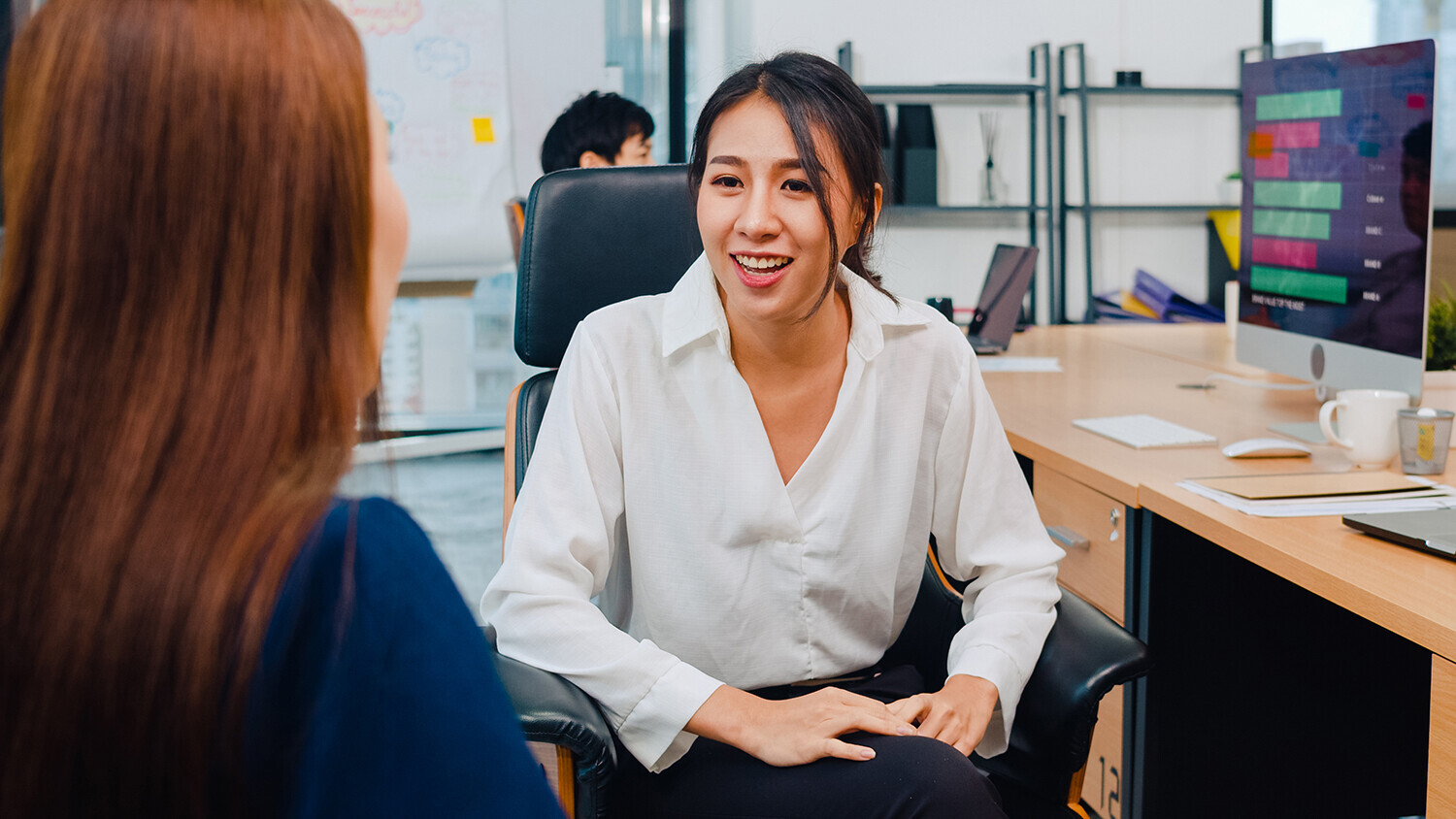 Women Chatting at Work