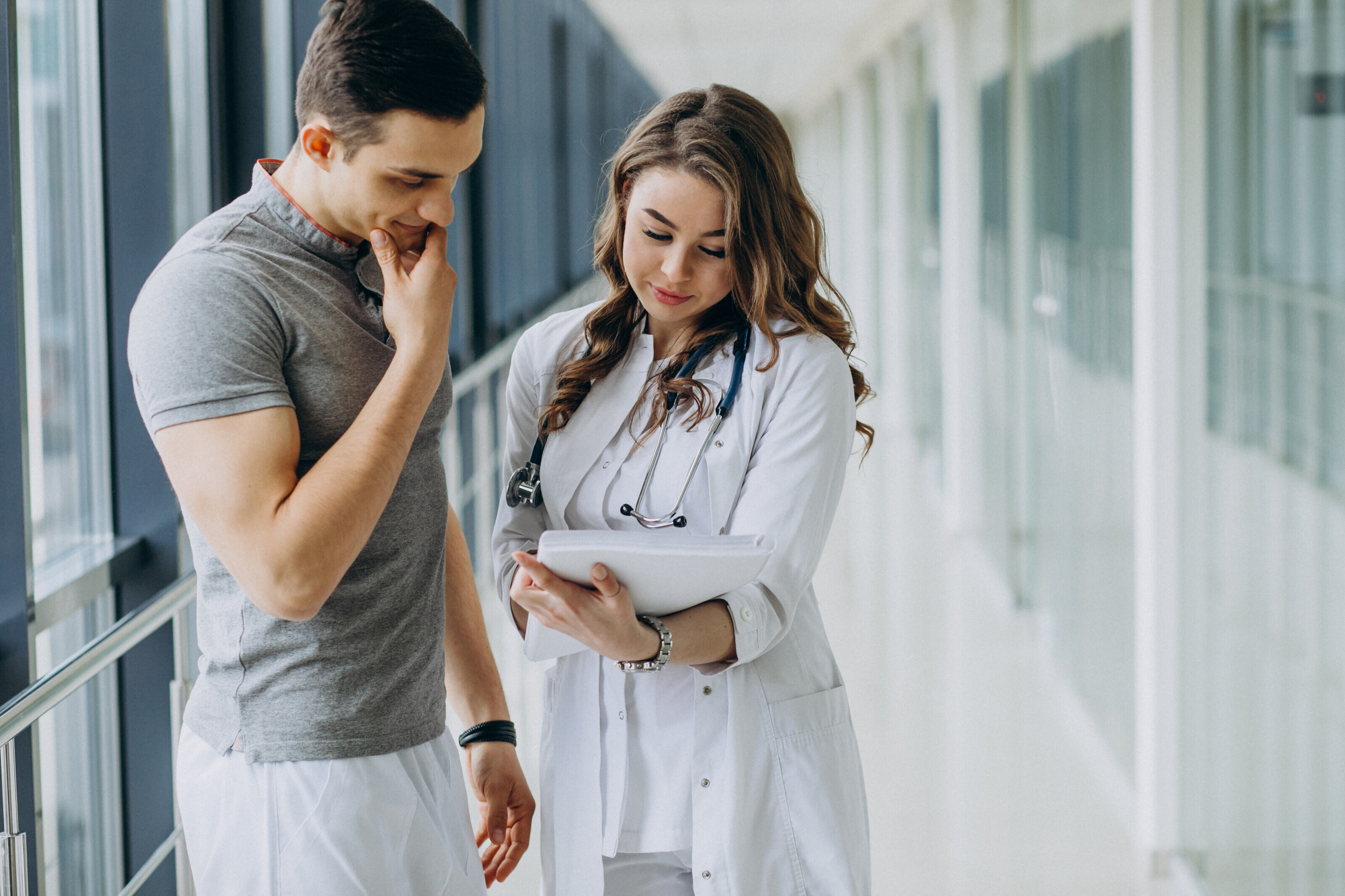 Dermatologist with male patient