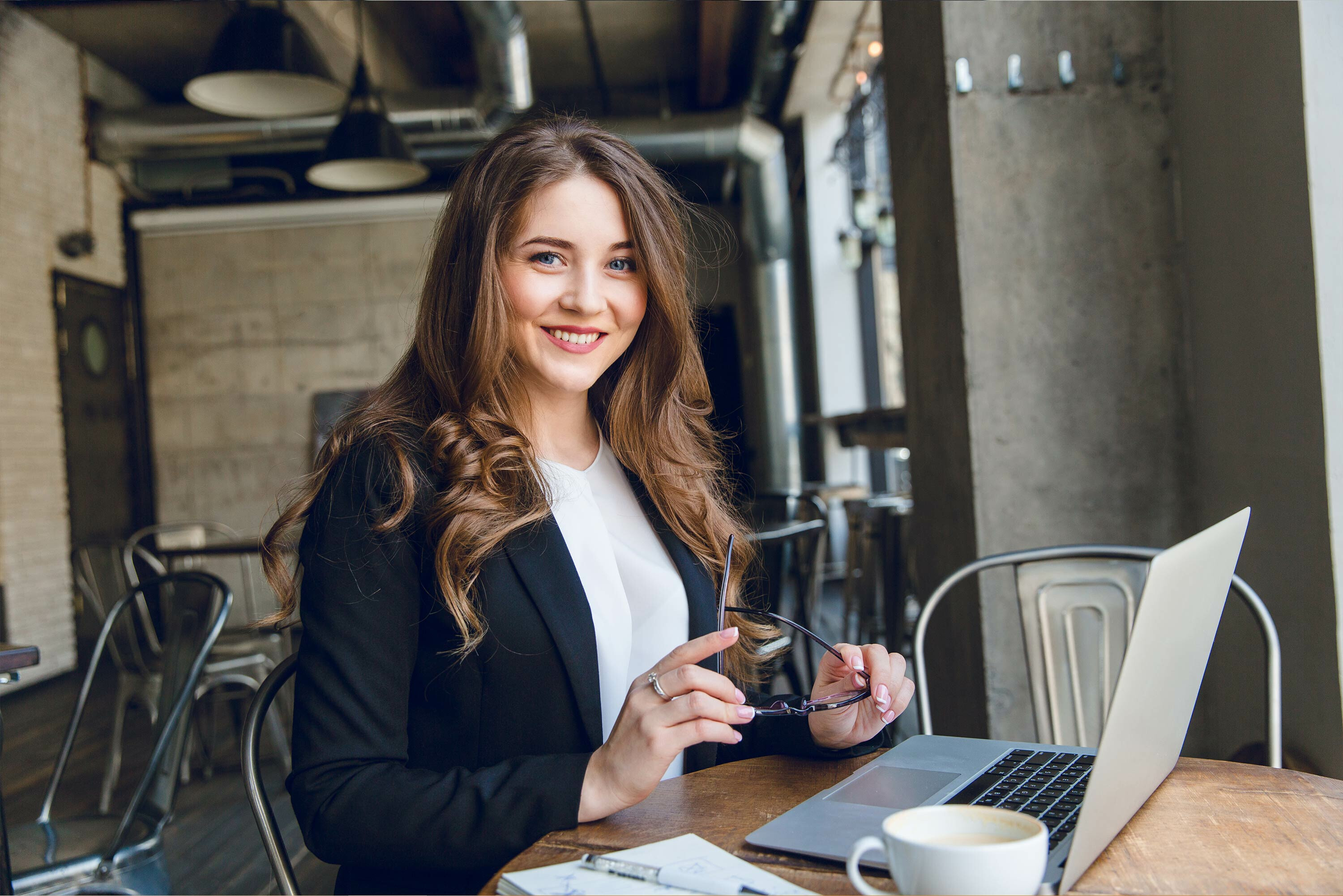 woman business owner smiling
