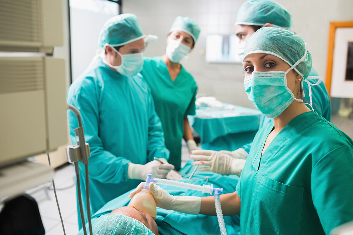 Anesthesiologist with patient