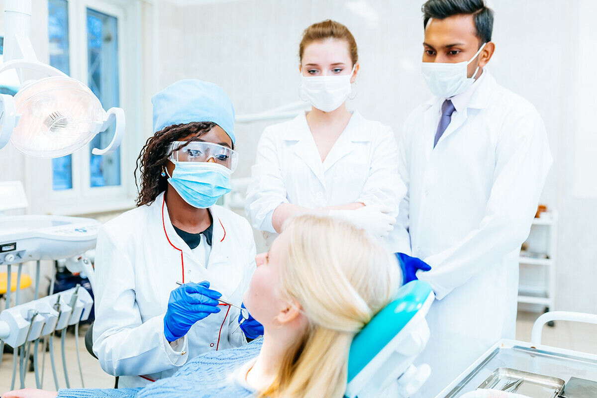 Team of dentists working on a patient