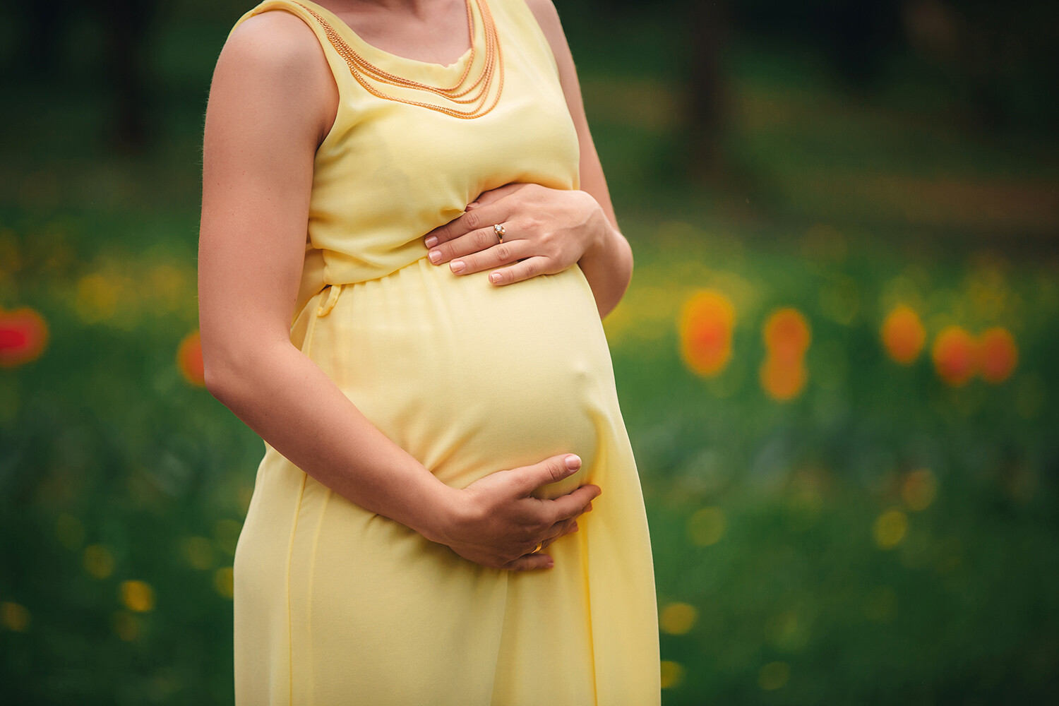 Pregnant woman in a field