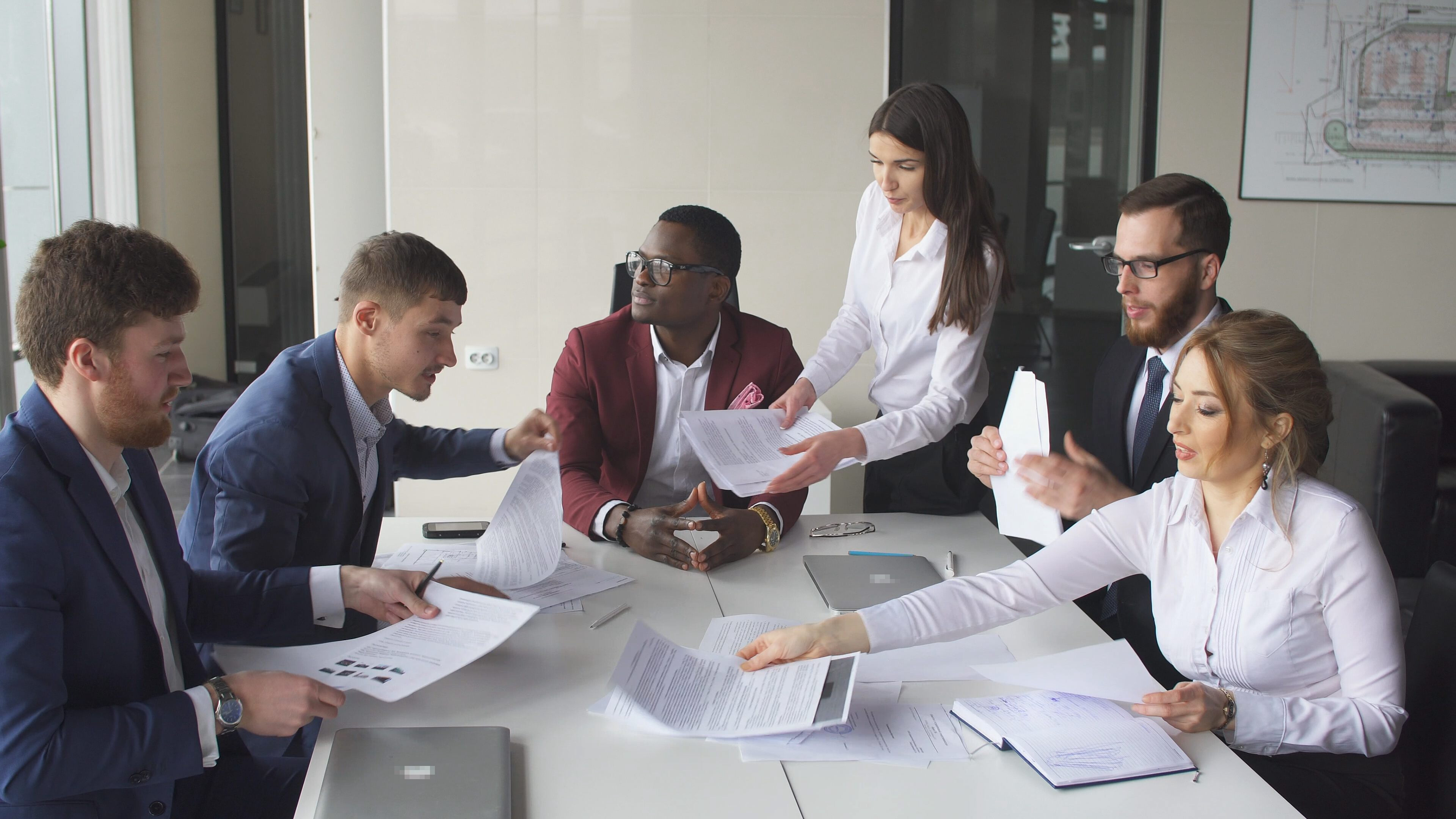 group of professionals around a table