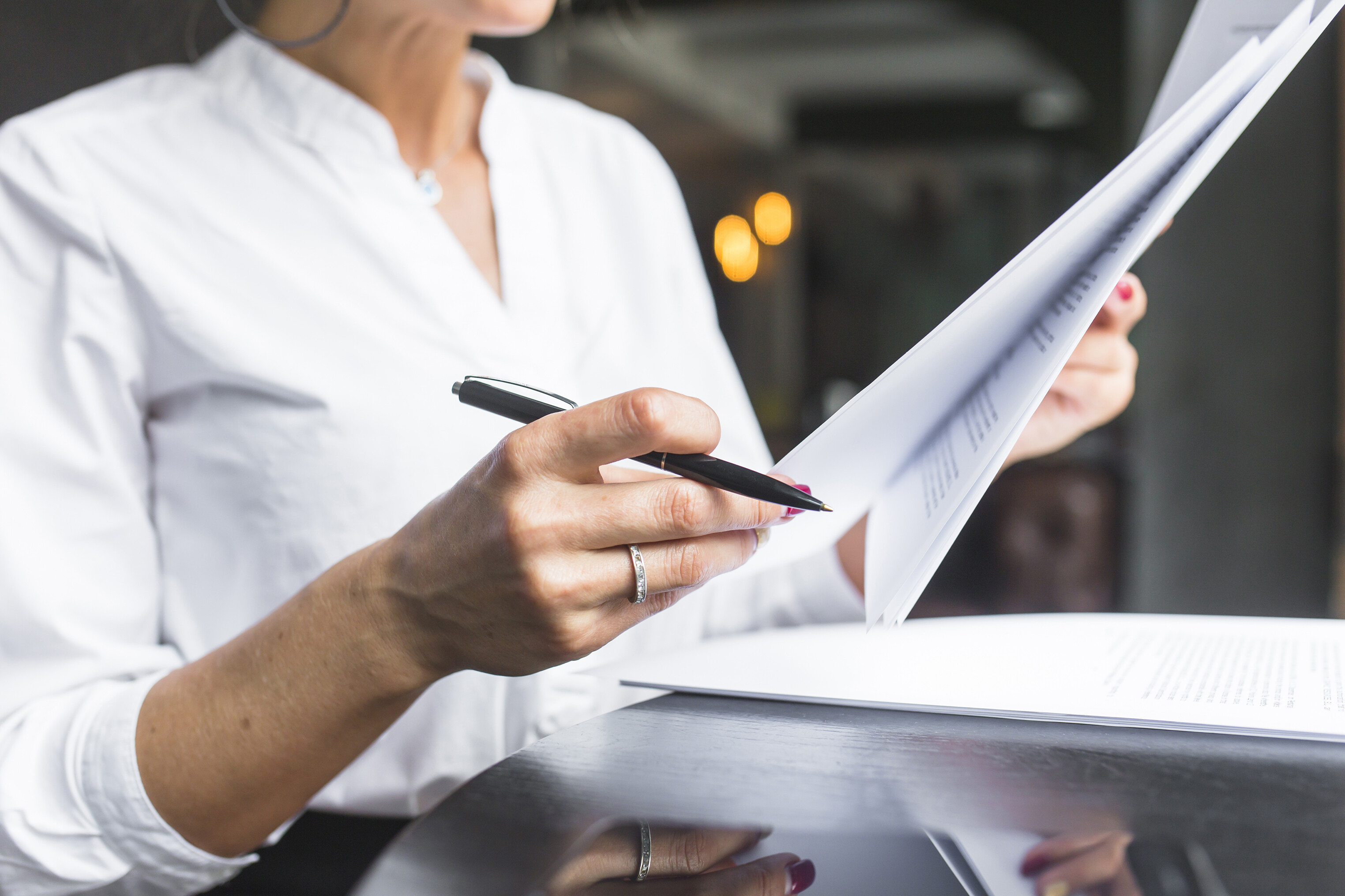 Woman looking at insurance policies