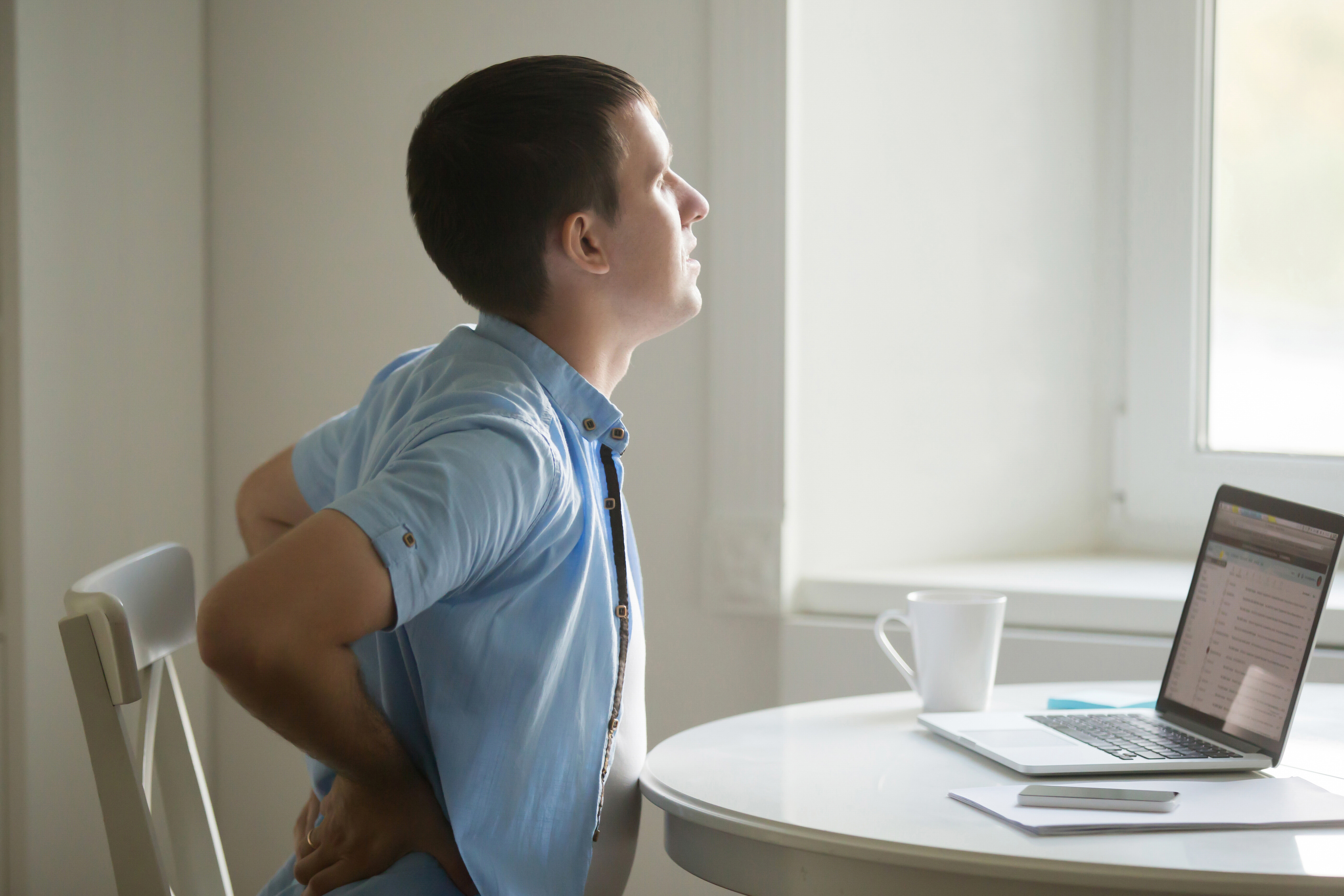 Businessman with an injured back