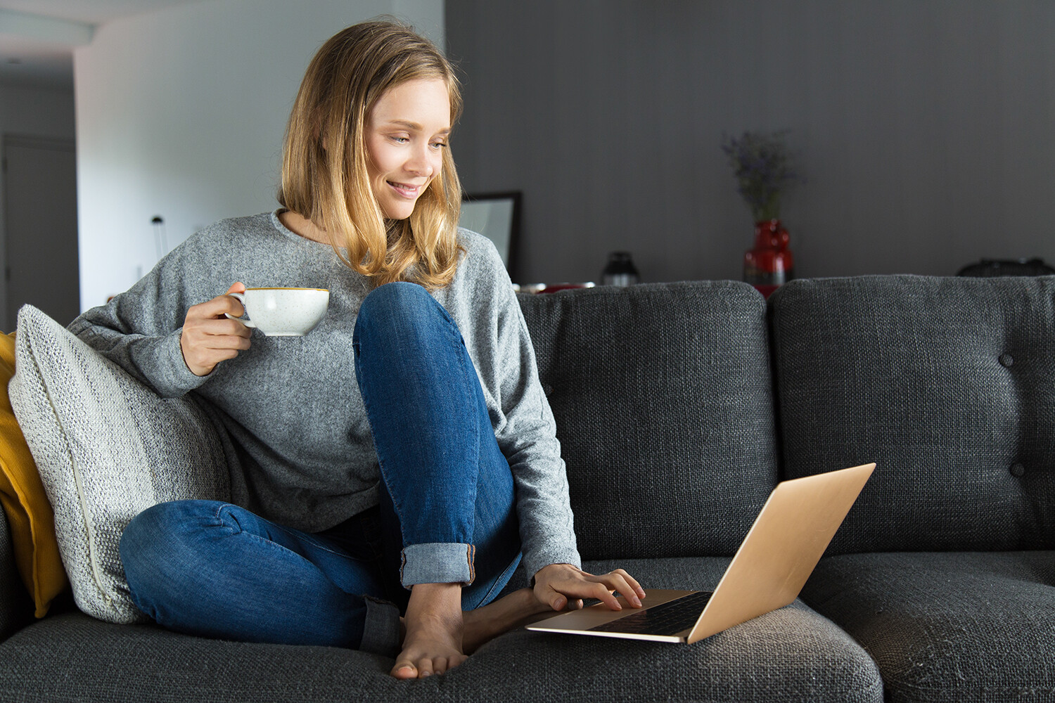 Woman working from home with tea