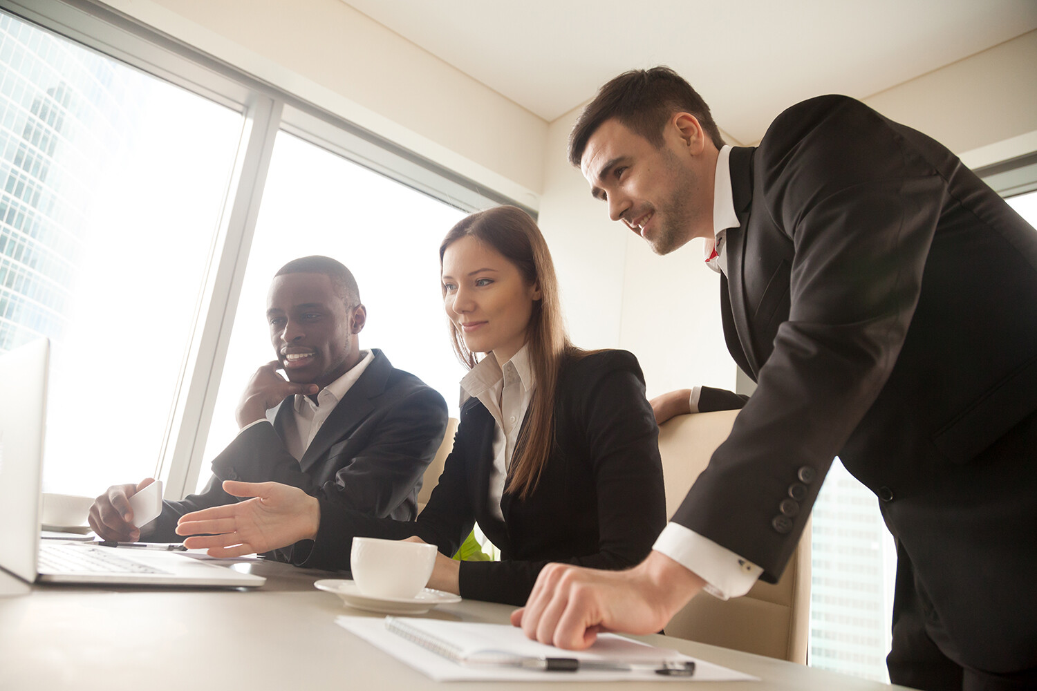 Diverse group of employees at desk