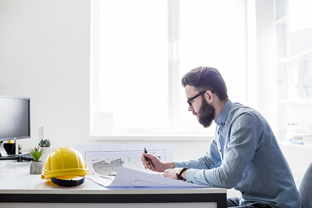 Structural Engineer Working at Computer