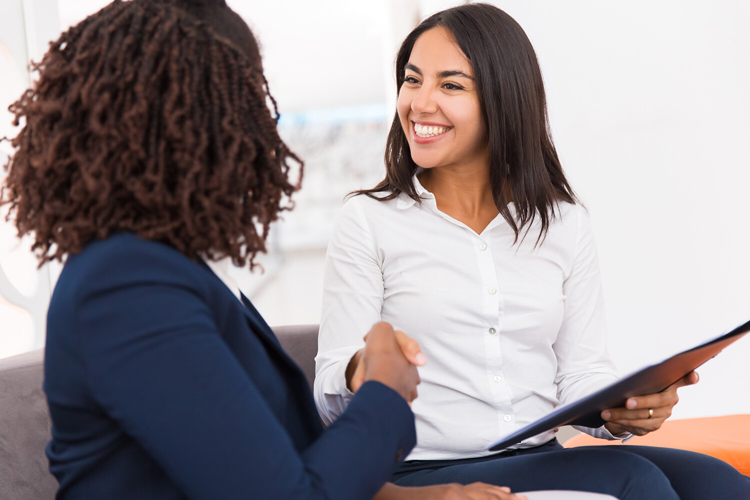 Business women making a deal